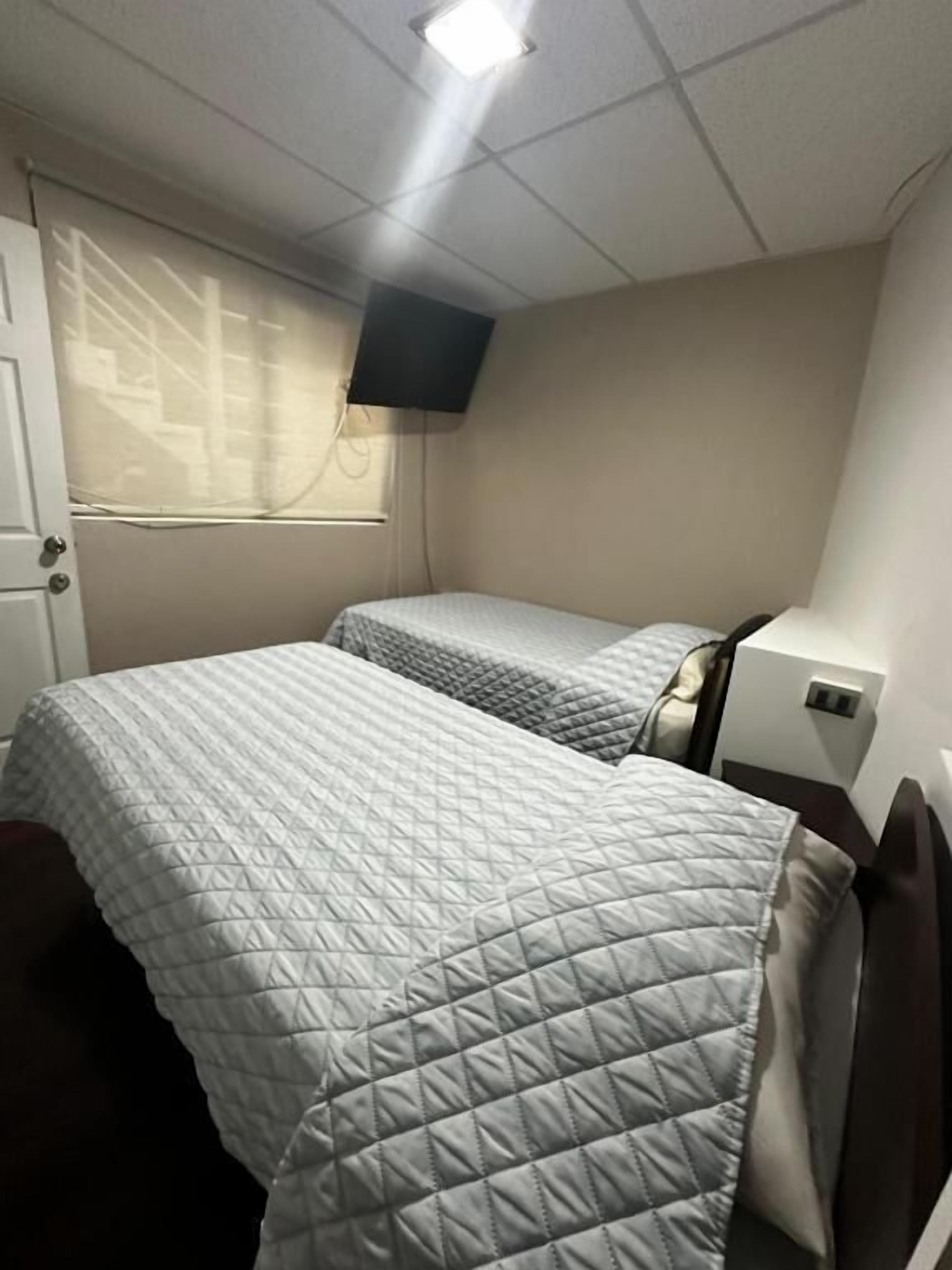 Quarto família, vista para a cidade | Wi-Fi de cortesia, acesso para cadeiras de rodas