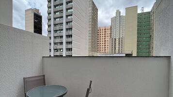 Apartamento | Restaurante al aire libre