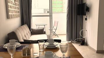 Apartamento | Área de estar | TV de tela plana