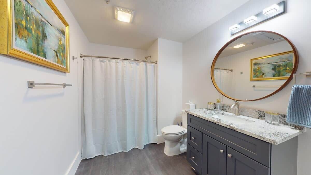 Shower, hair dryer, towels, shampoo