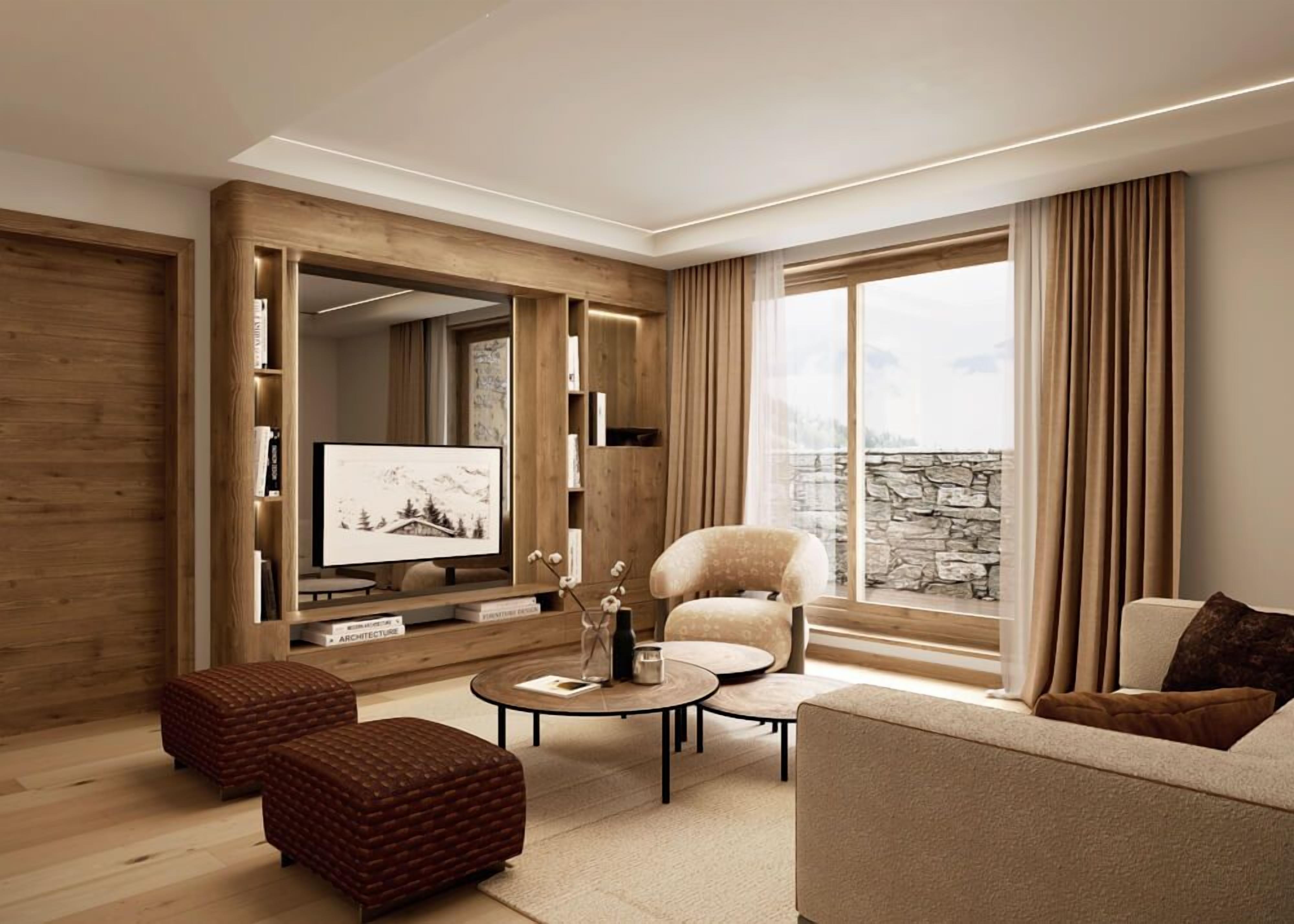 A modern living room with a flat-screen TV, a sofa, a chair, and a coffee table.
