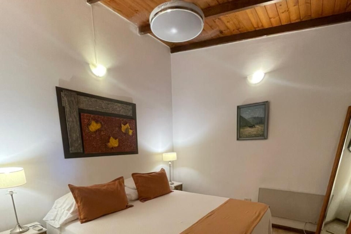 Suite, Patio, Garden View | In-room safe, iron/ironing board (on request), free WiFi, bed sheets