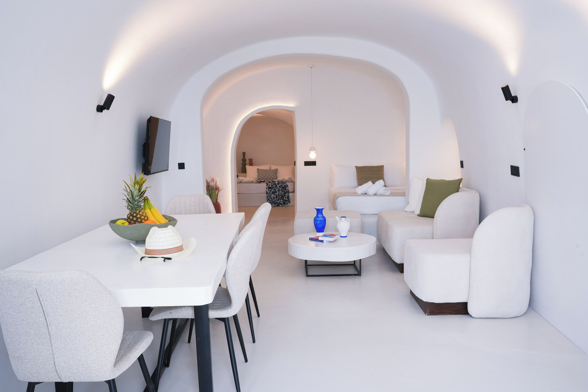 Suite Deluxe, vista al mar | Área de sala de estar