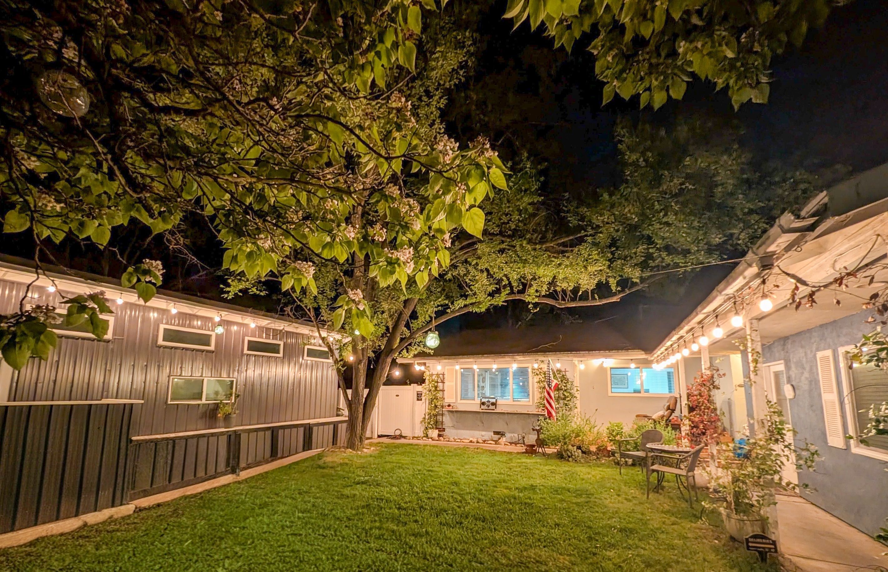 The Crum Road Compound front entry area, showing the U-shaped compound, with the Tiny home to the left, the main house in the center and the cozy cottage on the right. 