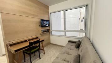 Apartamento | Área de estar | TV de tela plana