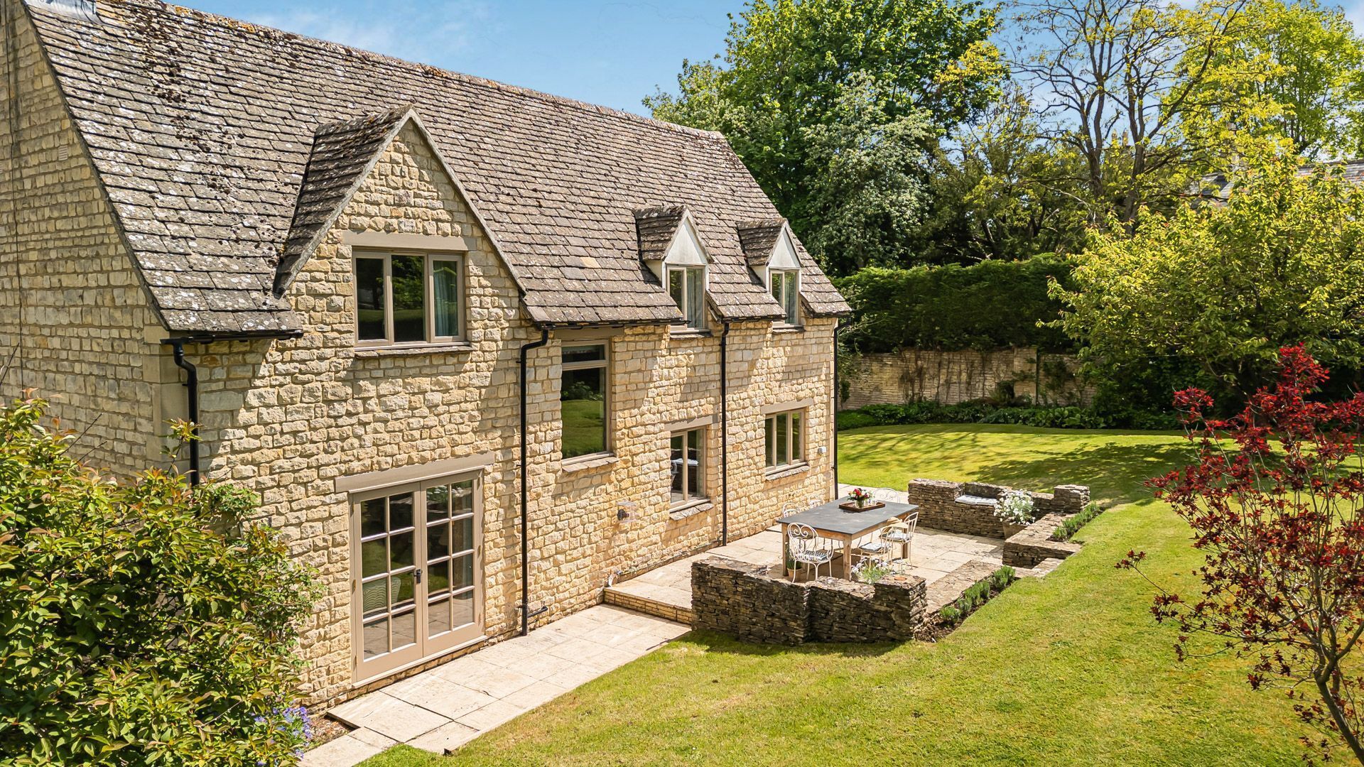 A honey-colour stone house in the beautiful Cotswold village of Lower Swell