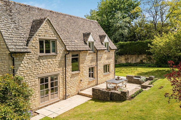 A honey-colour stone house in the beautiful Cotswold village of Lower Swell