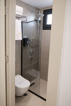 Deluxe Double Room, Balcony, City View | Bathroom | Shower, hair dryer, slippers, towels