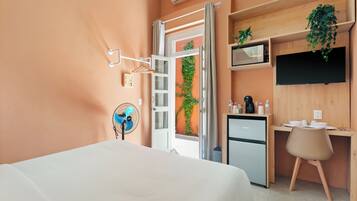 Comfort Apartment, Courtyard View | Desk, iron/ironing board, free WiFi