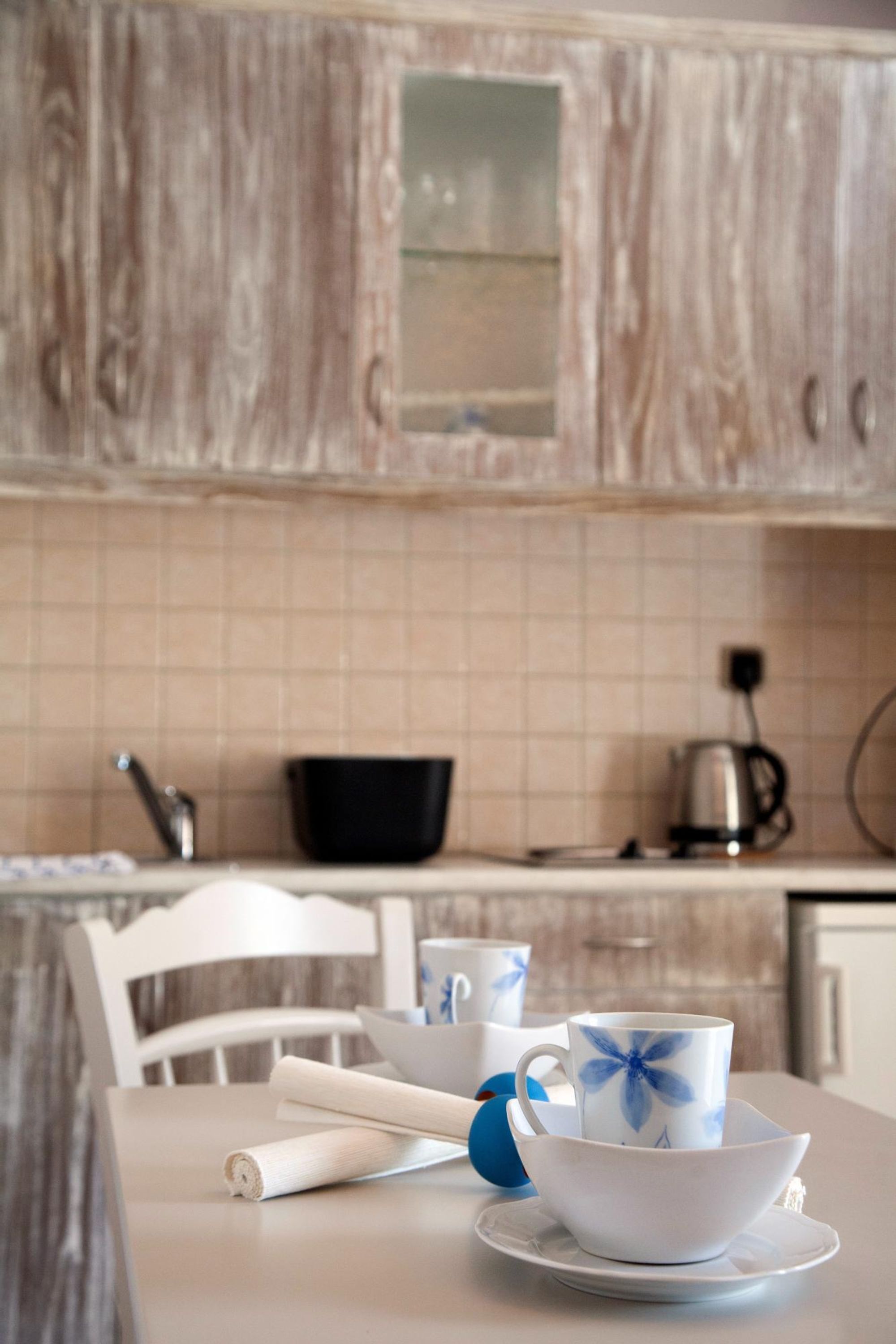 Fridge, coffee/tea maker, cookware/dishes/utensils