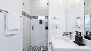 Hair dryer, towels, soap, toilet paper