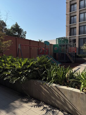 Children’s area - Beautiful Boutique Apartment with 2 Terraces and Green Country Club View (Guadalajara)