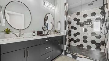 Shower, hair dryer, towels, shampoo
