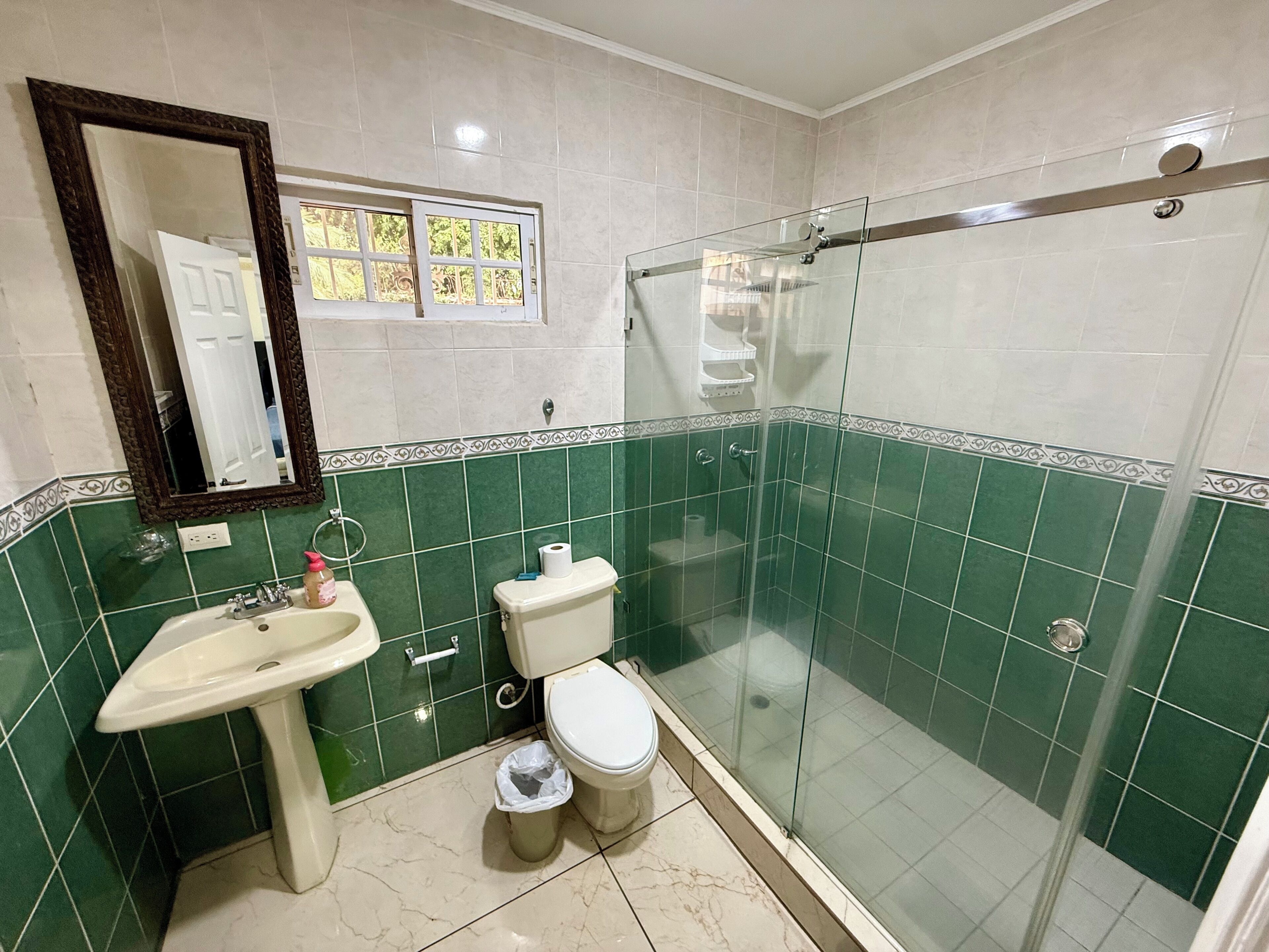 Economy Room, Patio | Bathroom | Shower, towels, soap, toilet paper