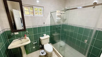 Economy Room, Patio | Bathroom | Shower, towels, soap, toilet paper