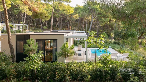 A modern villa with a pool, surrounded by dense forest. - Stunning home in Seget Vranjica with sauna (Seget Vranjica)