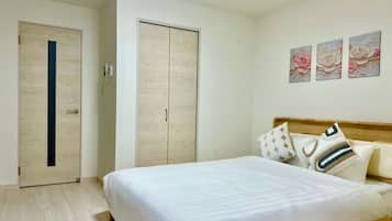 Premium bedding, desk, laptop workspace, free WiFi