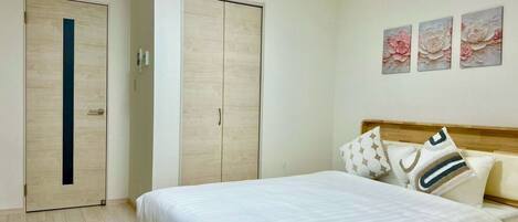 Premium bedding, desk, laptop workspace, free WiFi
