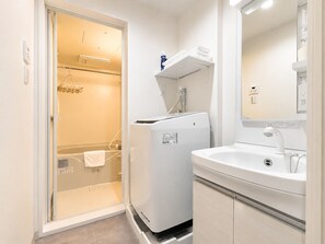 Separate tub and shower, hair dryer, towels, soap