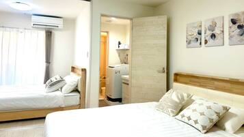 Premium bedding, desk, laptop workspace, free WiFi