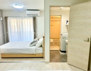 Premium bedding, desk, laptop workspace, free WiFi