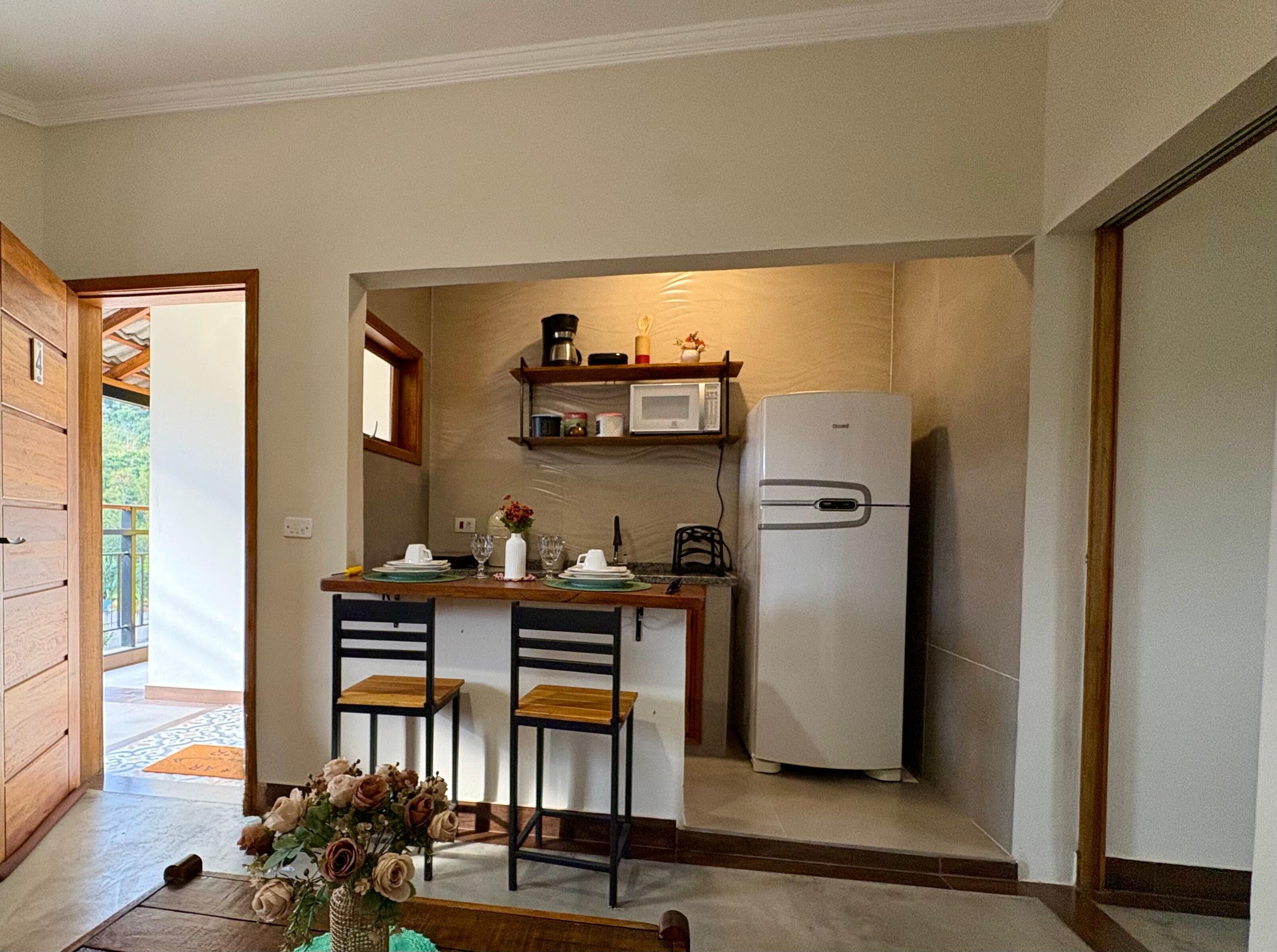 Fridge, microwave, stovetop, coffee/tea maker