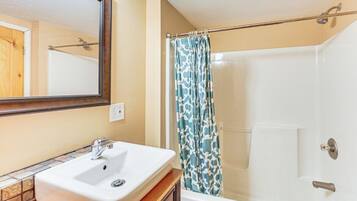 Hair dryer, towels, soap, shampoo