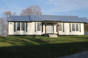 Exterior - Fully renovated one-level farmhouse, sleeps 8, with fenced yard and firepit. (Hampton)