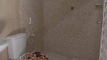 Toalhas de banho, papel higiênico
