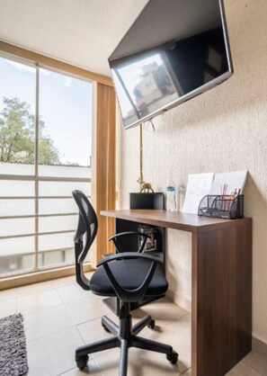 Apartamento família, vista para a cidade | Parte interna