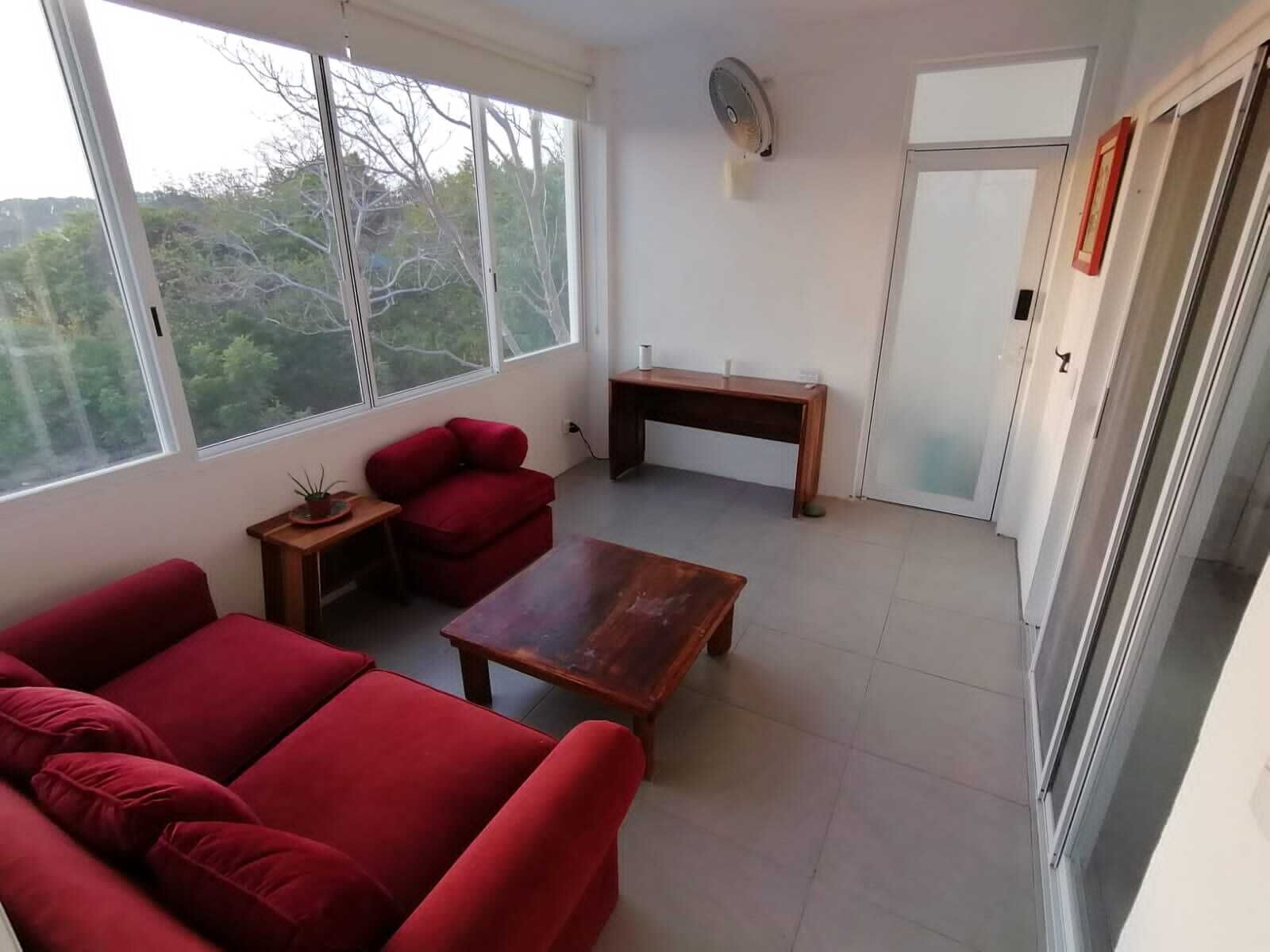 Deluxe Apartment, Garden View | Living area