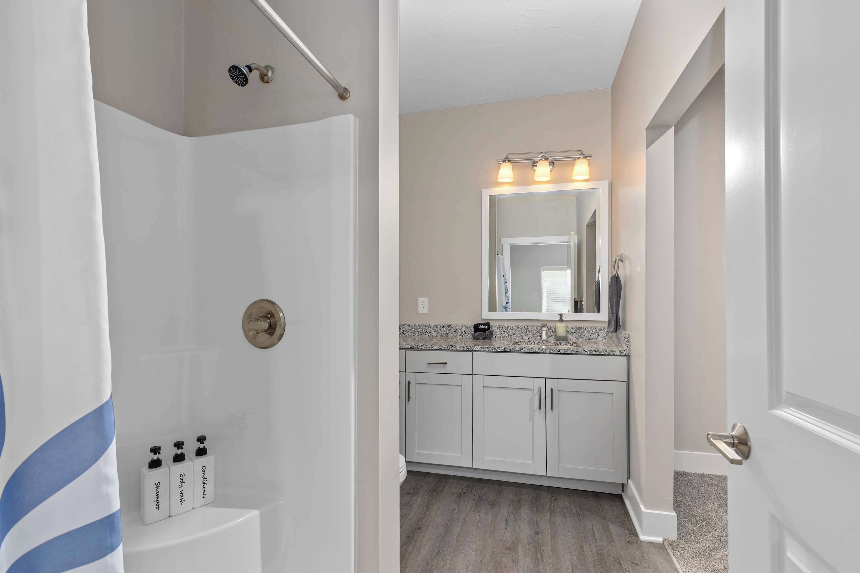 Shower, hair dryer, towels, shampoo