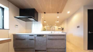 Suite, 2 Bedrooms | Private kitchen | Fridge, microwave, stovetop, toaster