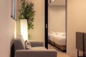 Suite, Multiple Beds | Living area