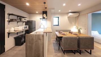 Apartment, 2 Double Beds | Private kitchen | Fridge, microwave, toaster, rice cooker