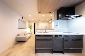 Suite, Multiple Beds | Private kitchen