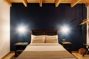 In-room safe, desk, laptop workspace, blackout drapes - Docecuartos Hotel (San Cristóbal de las Casas)