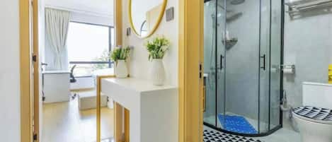 Shower, bidet, towels, soap