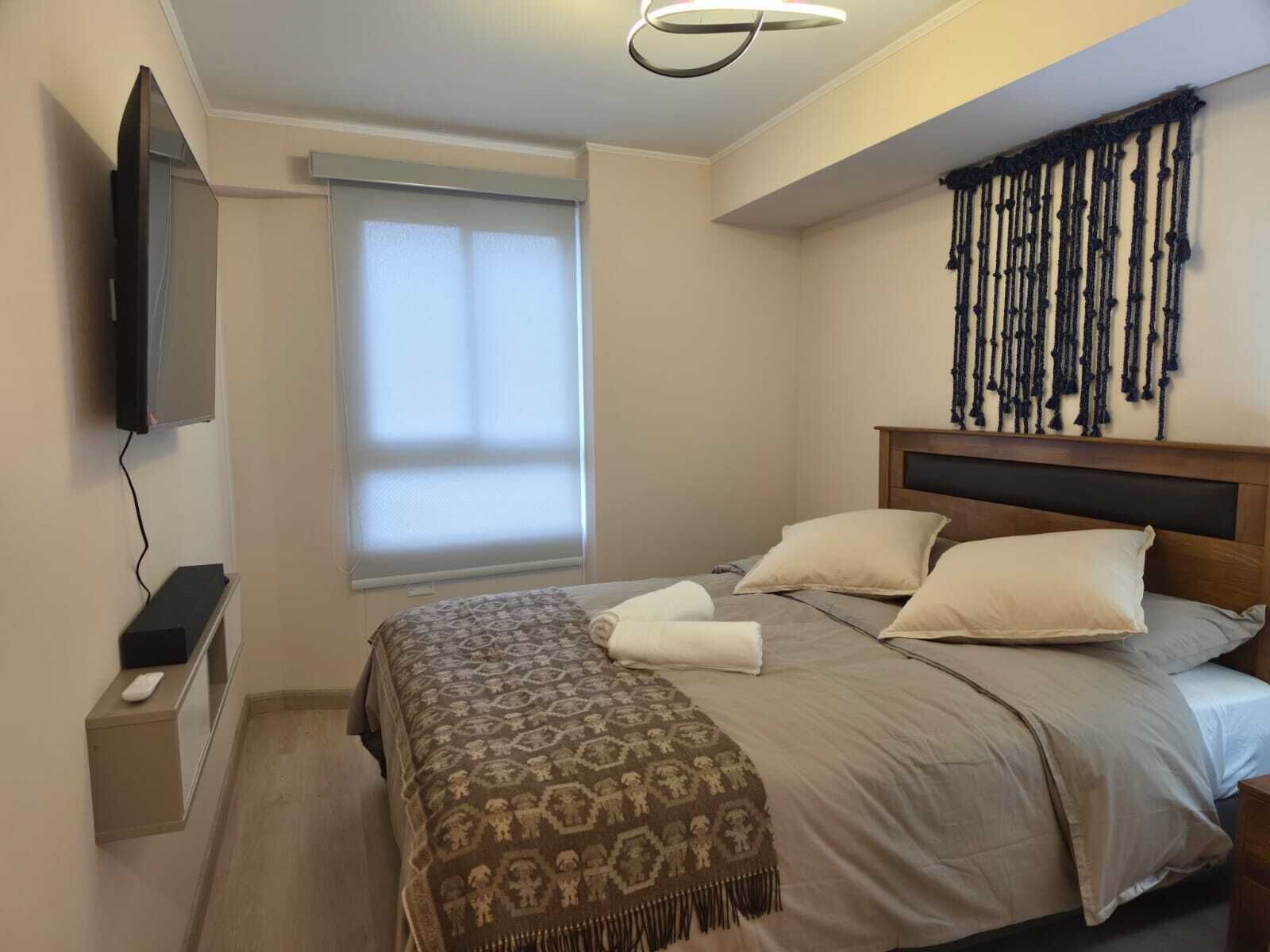 Apartamento superluxo, varanda coberta, vista para o mar | Ferros/tábuas de passar roupa, Wi-Fi de cortesia