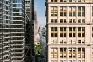 A multi-story building with large windows and a modern architectural style. - Sonder City Hall Park (New York)