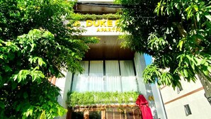 A multi-story building with a sign reading 'DUKE APARTMENTS.' - Duke Casa Apartment (Da Nang Municipality)