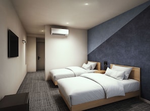 A hotel room with two beds, a flat-screen TV, an air conditioning unit, and a carpeted floor. - GRAND HOSTEL LDK Hiroshima (Hiroshima)