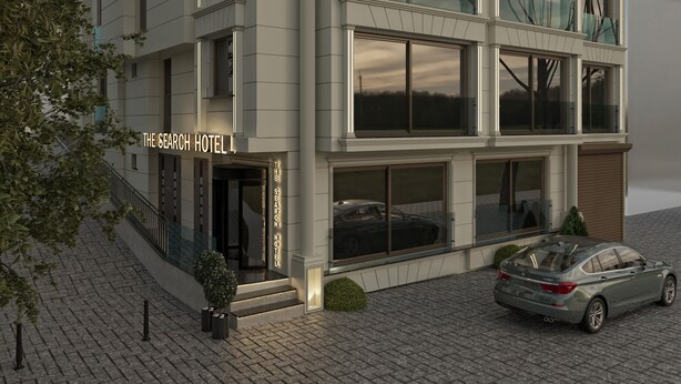 A modern hotel with a prominent sign, large windows, and a car parked in front. - The Search Hotels Bosphorus (Istanbul)