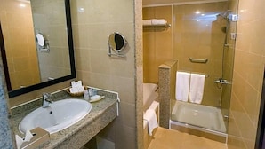 A bathroom with a sink, mirror, and a shower area. - Stella Gardens Resort Spa Makadi Bay (Makadi Bay)