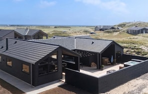 A modern house with multiple rooms and a large patio area. - Stunning home in Hvide Sande with sauna (Hvide Sande)