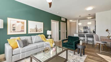 Apartment (1 Bedroom) | Living area | 50-inch TV with digital channels