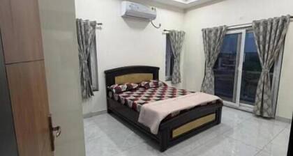 Elegant 2BHK Holiday Home with Terrace, Wi-Fi & Easy Airport Access