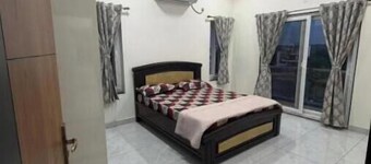 Elegant 2BHK Holiday Home with Terrace, Wi-Fi & Easy Airport Access
