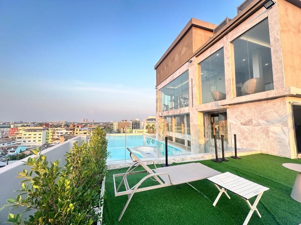 Outdoor pool, open 8:00 AM to 8:00 PM, sun loungers