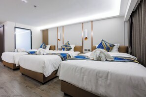 Economy Triple Room, City View | Premium bedding, desk, laptop workspace, blackout curtains - MARQUIS HOTEL (Bueng Kum)